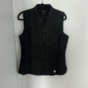 Black medium women’s Hurley vest, slightly worn in great condition though